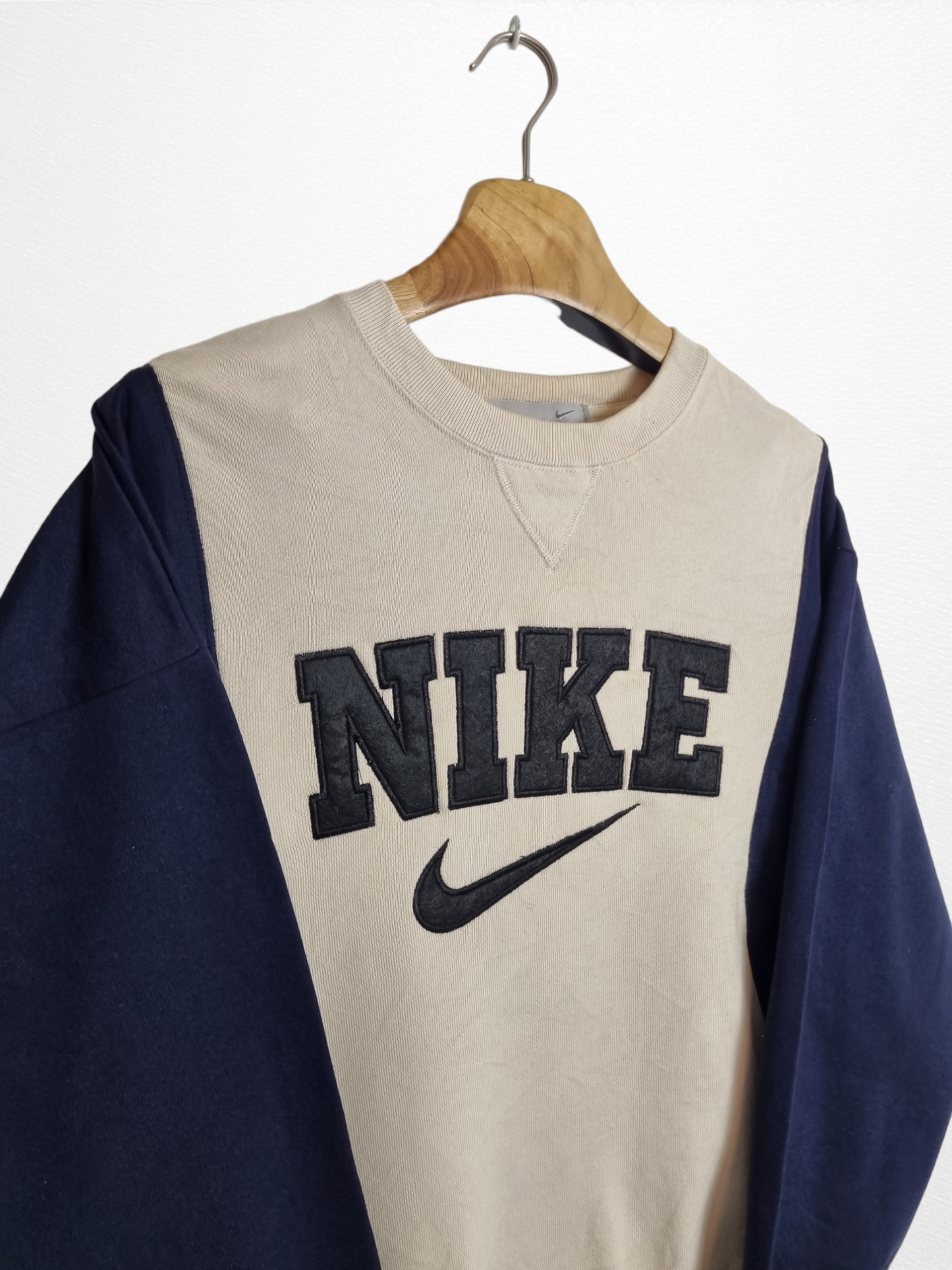 Nike a retravaillé épeler la taille du pull M/L